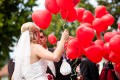 Geld in Luftballons